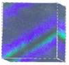 Swatch of an iridescent color in blue and green tones, an example of a color mark